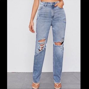 Ripped retail wash jeans